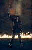 Claudia Christian : Claudia Christian with a sword inside a circle of fire