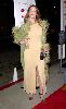 Claudia Christian : looks stunning on the red carpet with that feathery green coat