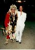 Claudia Christian : Claudia Christian with a man who is wearing an indian costume