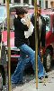 Suri Cruise : Katie Holmes in blue jeans is holdig her  toddler daughter Suri Cruise arrive at their apartment in NYC