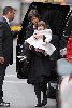 Suri Cruise : Katie and daughter Suri are out of the car to start their day