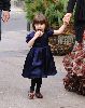 Suri Cruise : looks amazing in the navy dress and the dark red flat shoes