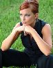 Christy Hemme in a black pants and vest