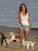 Jennifer Aniston : Jennifer walking her dogs at the beach