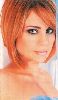 carole samaha : Carole short orange hair cut