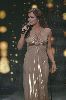 carole samaha : carole on stage wearing a beige dress