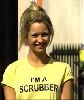 Jessica Jane Clement : wearing an i m a scrubber yellow tshirt