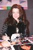 Claudia Christian : signing autographs for her fans