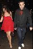 Lisa Snowdon : wearing a short red dress walking with David Walliams hand in hand