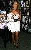 Tila Tequila : wearing a short layered open-shoulder dress and a large black belt at the promotion gathering of her new book Hooking Up with Tila Tequila