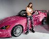 Yuko Aoki : standing infront of a pink sport car