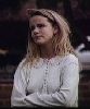 Amanda Peterson : wearing a simple white sweater