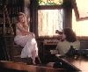 Amanda Peterson : photoshoot session sitting on a chair s arm