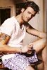 Kivanc Tatlitug : drinking his morning coffee wearing his pijamas