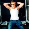 Michael Pitt : smoking a cigerrette and trying to tie his hair, looks sexy in that undershirt