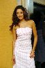 Azra Akin in a stylish backless long white dress