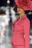 Azra Akin wearing a large pink flower hat