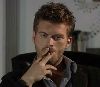 Kivanc Tatlitug smoking cigerrette