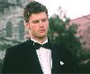 Kivanc Tatlitug wearing a Tuxedo suit