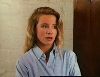 Amanda Peterson in a blue large shirt