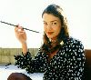 Claudia Christian smoking cigerrete