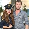 Roula Saad as a traffic police woman with Kivanc Tatlitug