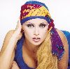 Roula Saad wearing a colordul head scarf