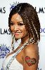 Tila Tequila large high quality photo posing at Gavin Maloof's Housewarming Party on October 25, 2007