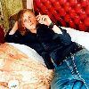 Michael Pitt smoking on his bed