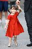 Suri Cruise in a glam red dress