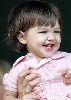 Suri Cruise happy and laughing