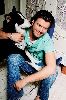 Kivanc Tatlitug : playing with his dog