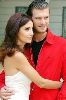 Songul Oden hugging Kivanc Tatlitug who is wearing a red jacket