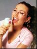 Thalia looking cute with eyeglasses eating an icecream cone