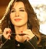 Nancy Ajram wearing glam sunglasses