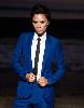 VICTORIA BECKHAM : wearing a blue male-style suit