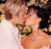 VICTORIA BECKHAM : kissing David Beckham