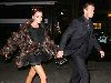 VICTORIA BECKHAM : arriving at Nobu restaurant with David Beckham wearing a stylish brown fur jacket and a high heel black shoe on November 2008