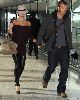 VICTORIA BECKHAM : with David Beckham at Londons Heathrow Airport on October 18th, 2008