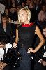 VICTORIA BECKHAM : desktop wallpaper high quality photo wearing a black-red collar top and a navy skirt