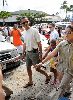 Barack Obama : holds his daugher Sasha s hand while walking to get shaved ice during an afternoon outting December 26, 2008 in Hawai i Kai,  Hawaii