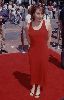 Linda Kozlowski : on the red carpet wearing a red dress