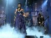 Rihanna : singing live wearing a princess navy and silver dress