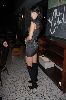 AnnaLynne McCord : wearing a gray knit dress and black high heels boots at the Miami Beachclub on the 30th, Decemeber 2008