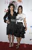 Kourtney Kardashian : with Kim on the red carpet for the 7th Annual Breakthrough Of The Year Awards on December 9, 2007