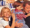 Jett Travolta at 3 years old with Kelly Preston and John Travolta