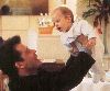 Jett Travolta as a baby with father John Travolta