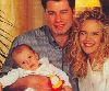 baby Jett Travolta with Kelly Preston and John Travolta