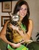 Lucy Pinder hugging her cat, quite a fat one