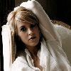 Liz Phair white sweater resting on an arm chair